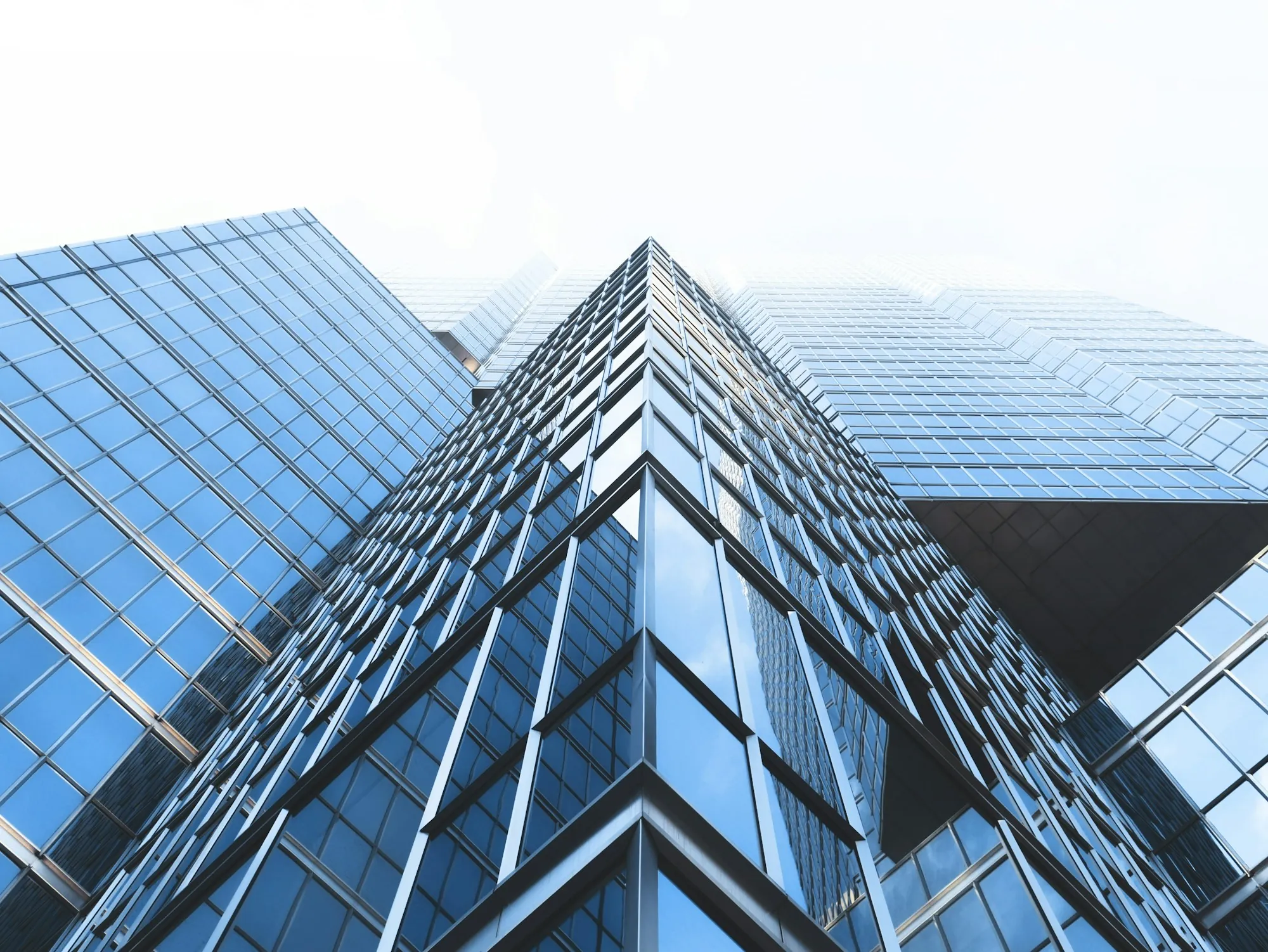 Glass skyscraper rising against the sky