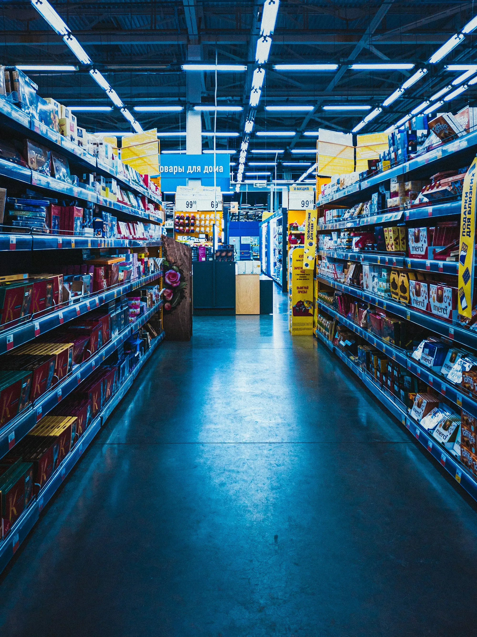 Shelving aisle in a storage facility with a polished floor